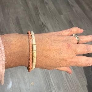 Two bangle bracelets